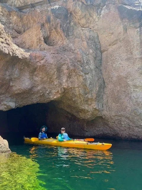 Kayakers enjoying a team adventure on the Colorado River