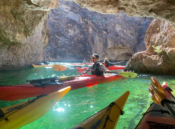 Couple kayaking together on scenic water