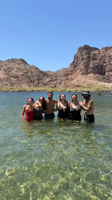 Group cooling off in a clear cove along the Colorado River