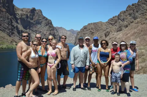 A group of guests gathered in a Colorado River canyon