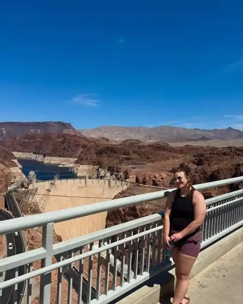 Guest overlooking Hoover Dam and Lake Mead from the bridge