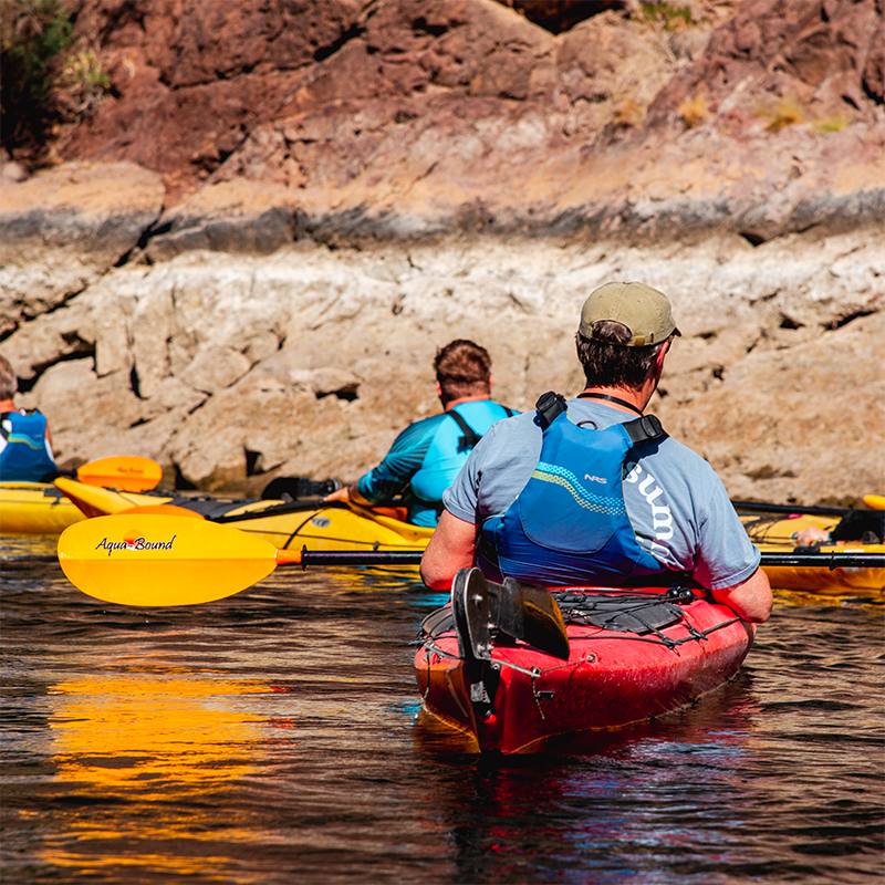 Kayakers paddling in Las Vegas as part of the Evolution Expeditions guided tour.