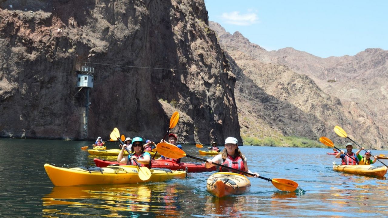 Guided group kayaking on the Colorado River near Hoover Dam with Evolution Expeditions